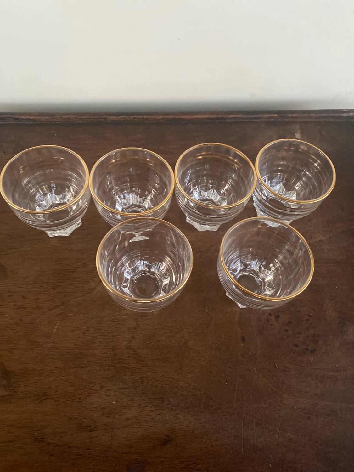 6 small golden glasses