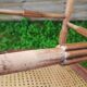 Corner chair in beech, caned seat from the early 20th century.