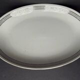 4 small oval porcelain dishes