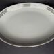 4 small oval porcelain dishes
