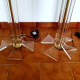 Pair of plexiglass and brass floor lamps