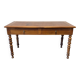 Cherry wood desk with a leather top.