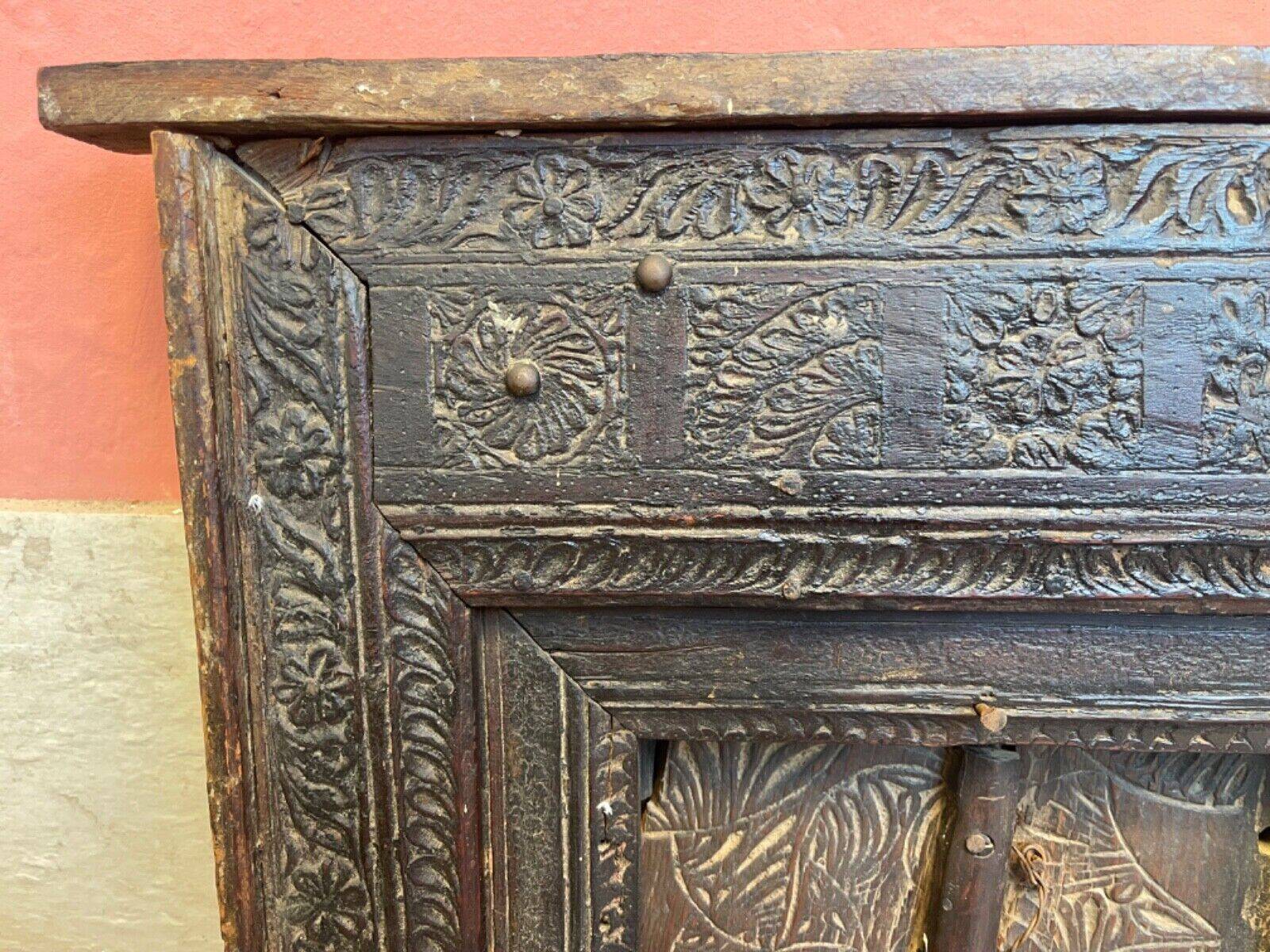 Old Indian window with carved decoration of flowers and foliage 19th century