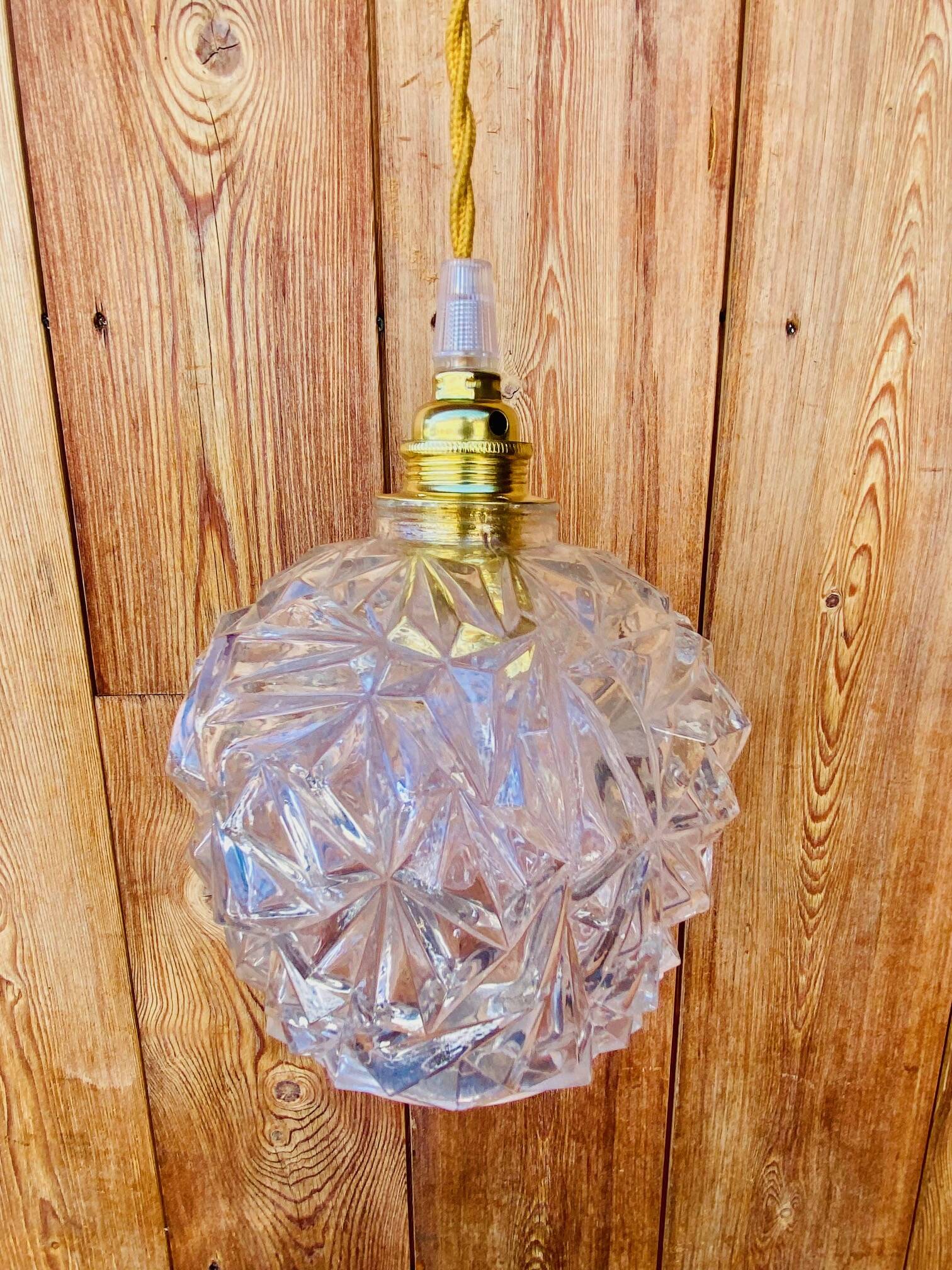 Globe pendant light in chiseled glass