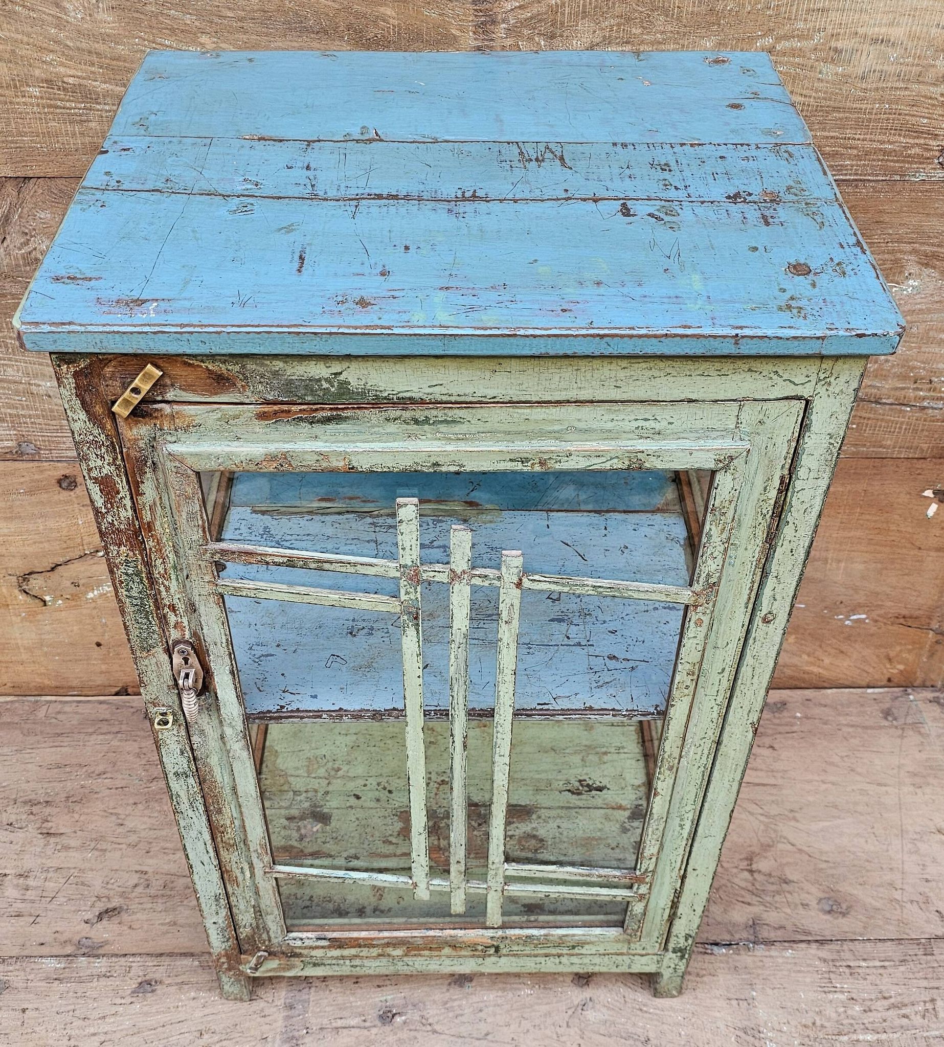 Art Deco glass-fronted bar cabinet in teak