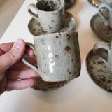 Series of stoneware cups and saucers