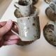 Series of stoneware cups and saucers