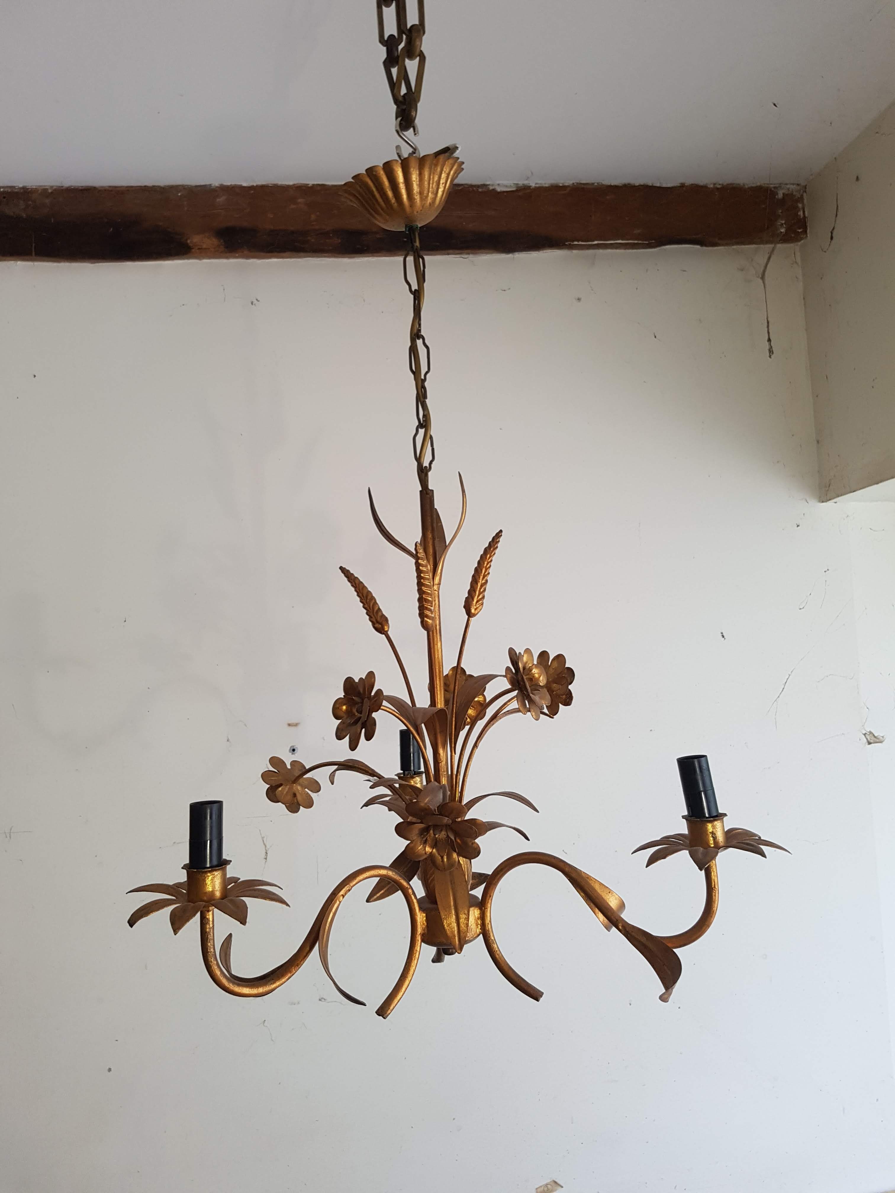 Gold metal chandelier with ear of wheat decor