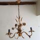 Gold metal chandelier with ear of wheat decor