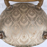 Carved and gilded wooden armchair in Louis XVI style, circa 1900