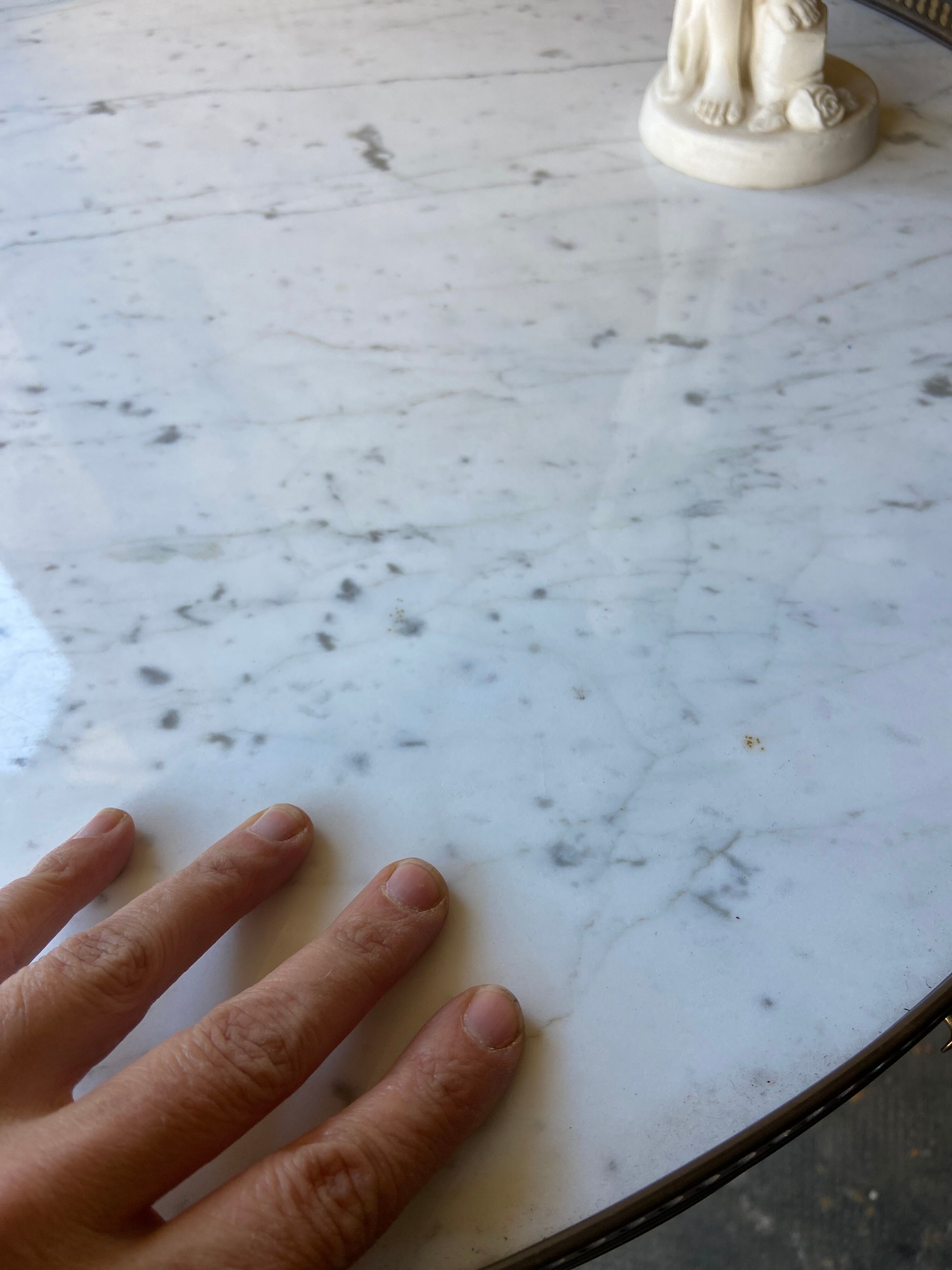 White marble hot water bottle table