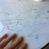 White marble hot water bottle table