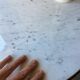 White marble hot water bottle table