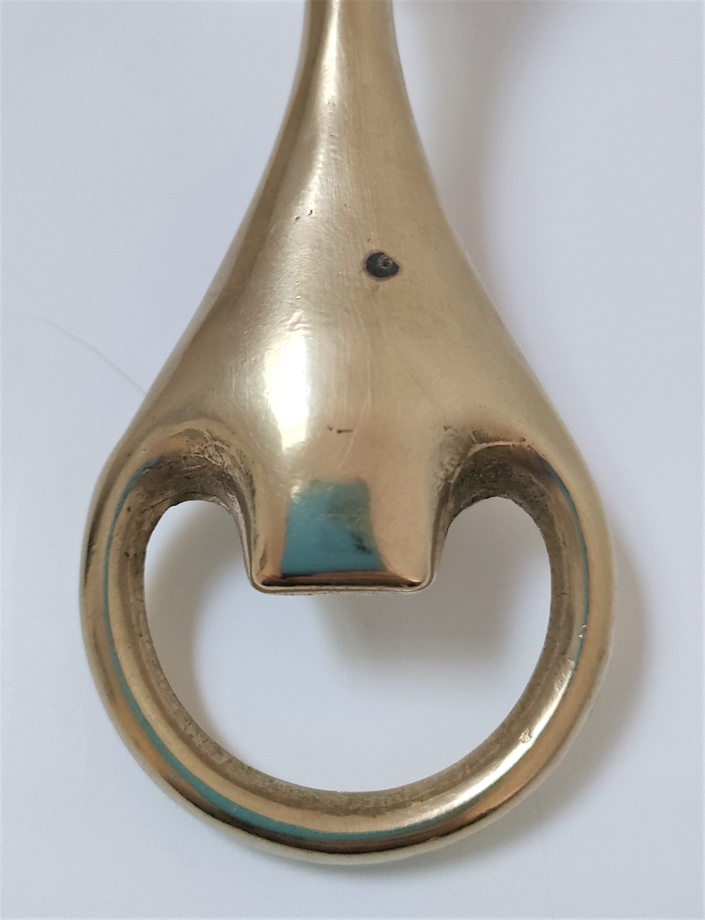 Modernist solid brass bottle opener by Carl Auböck