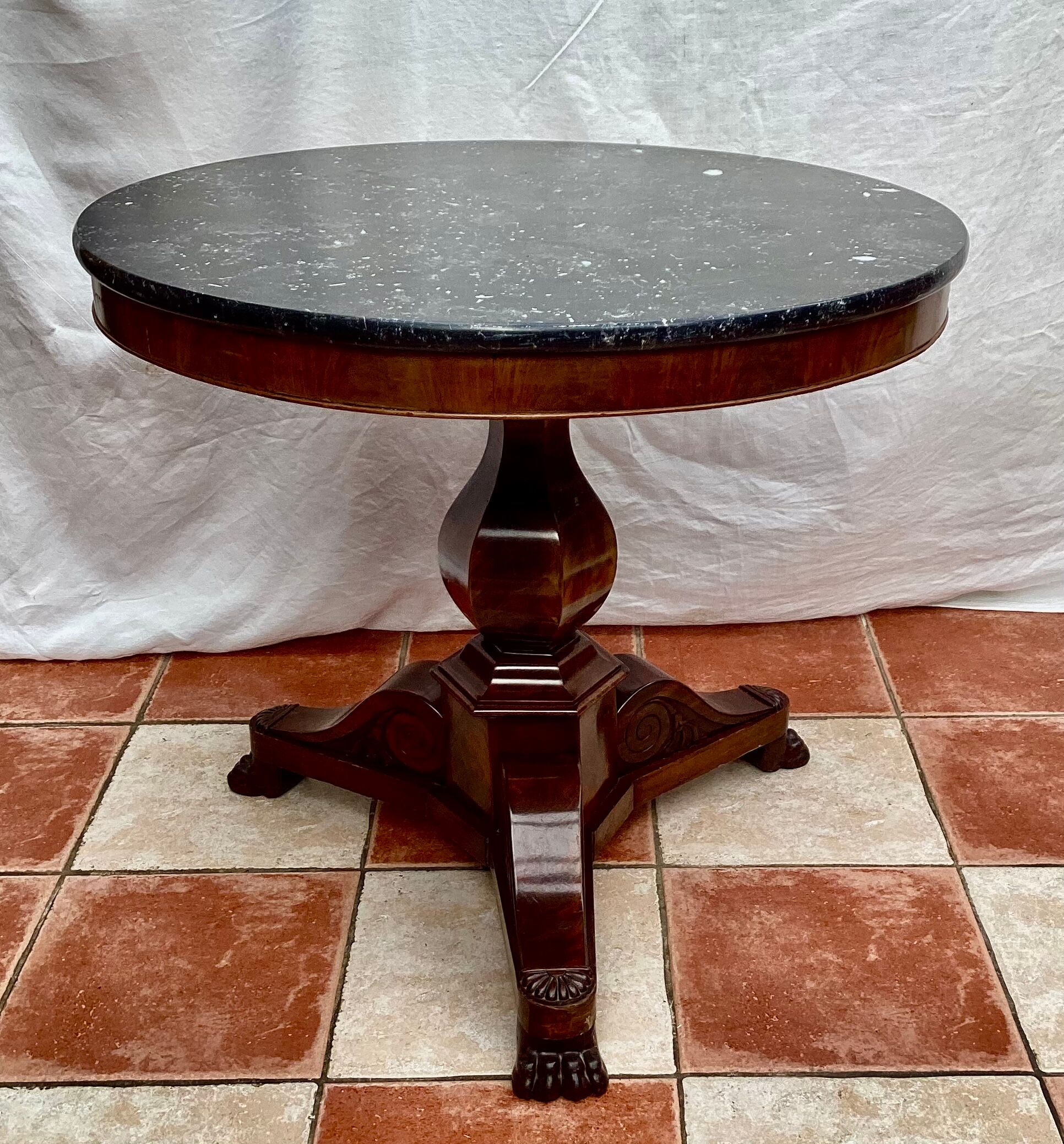 Old pedestal table in oak wood with marble