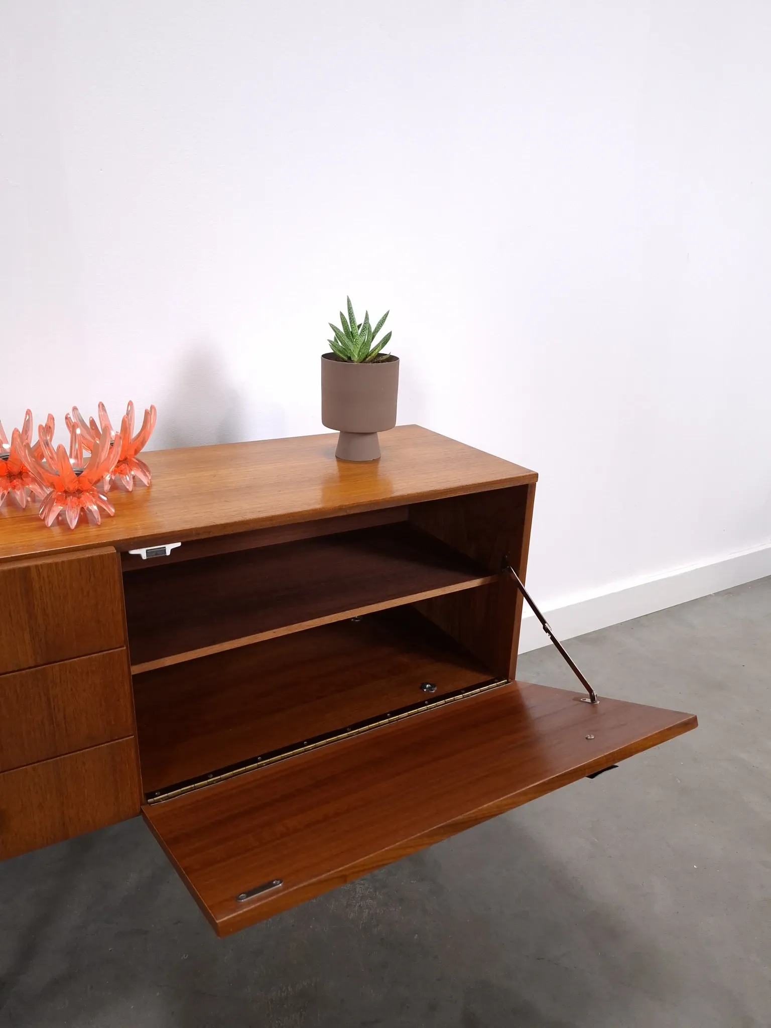 Vintage small teak cabinet with drawers, flap and black handles, hallway cabinet.