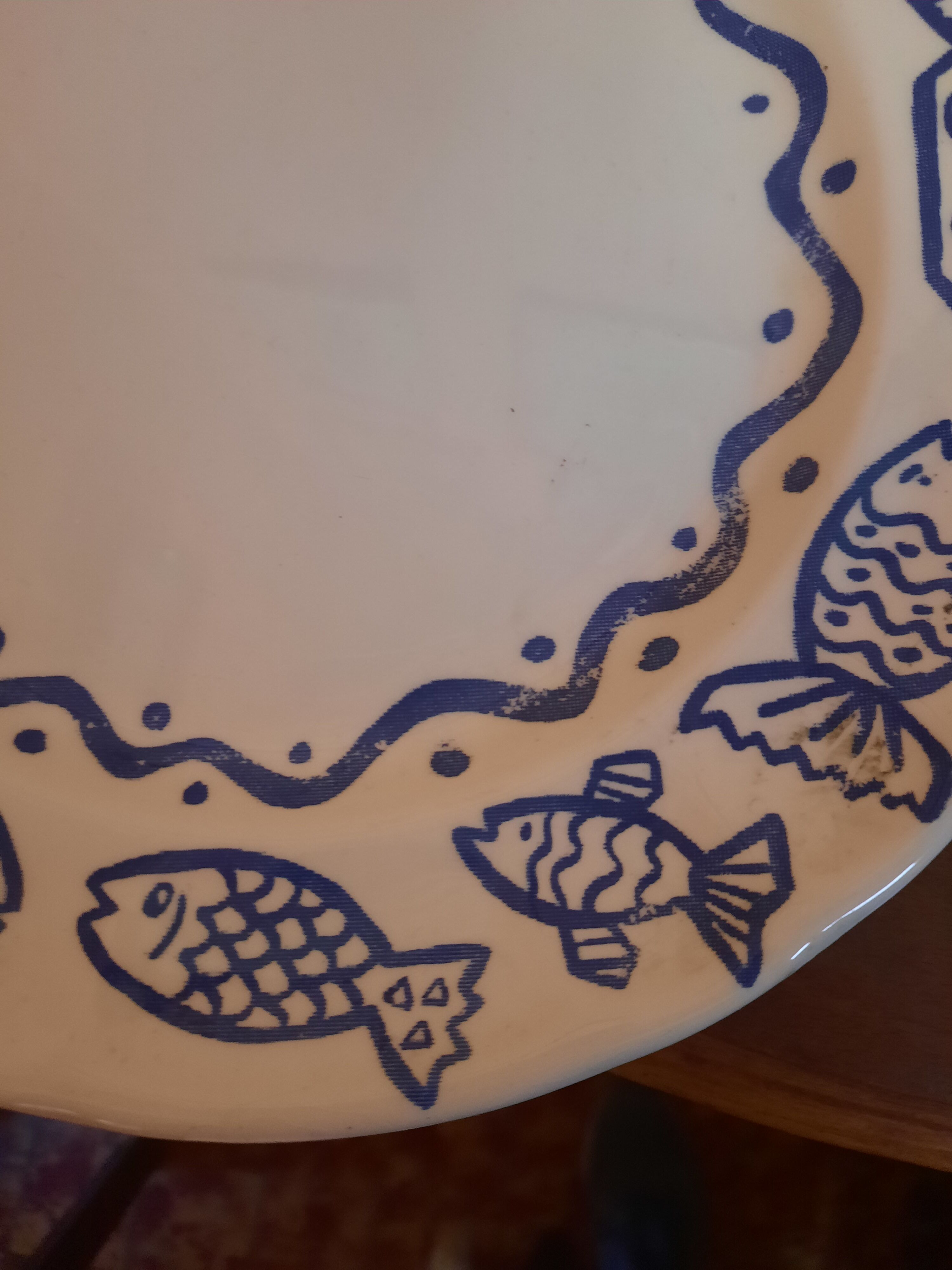 Duo of plates decorated fish