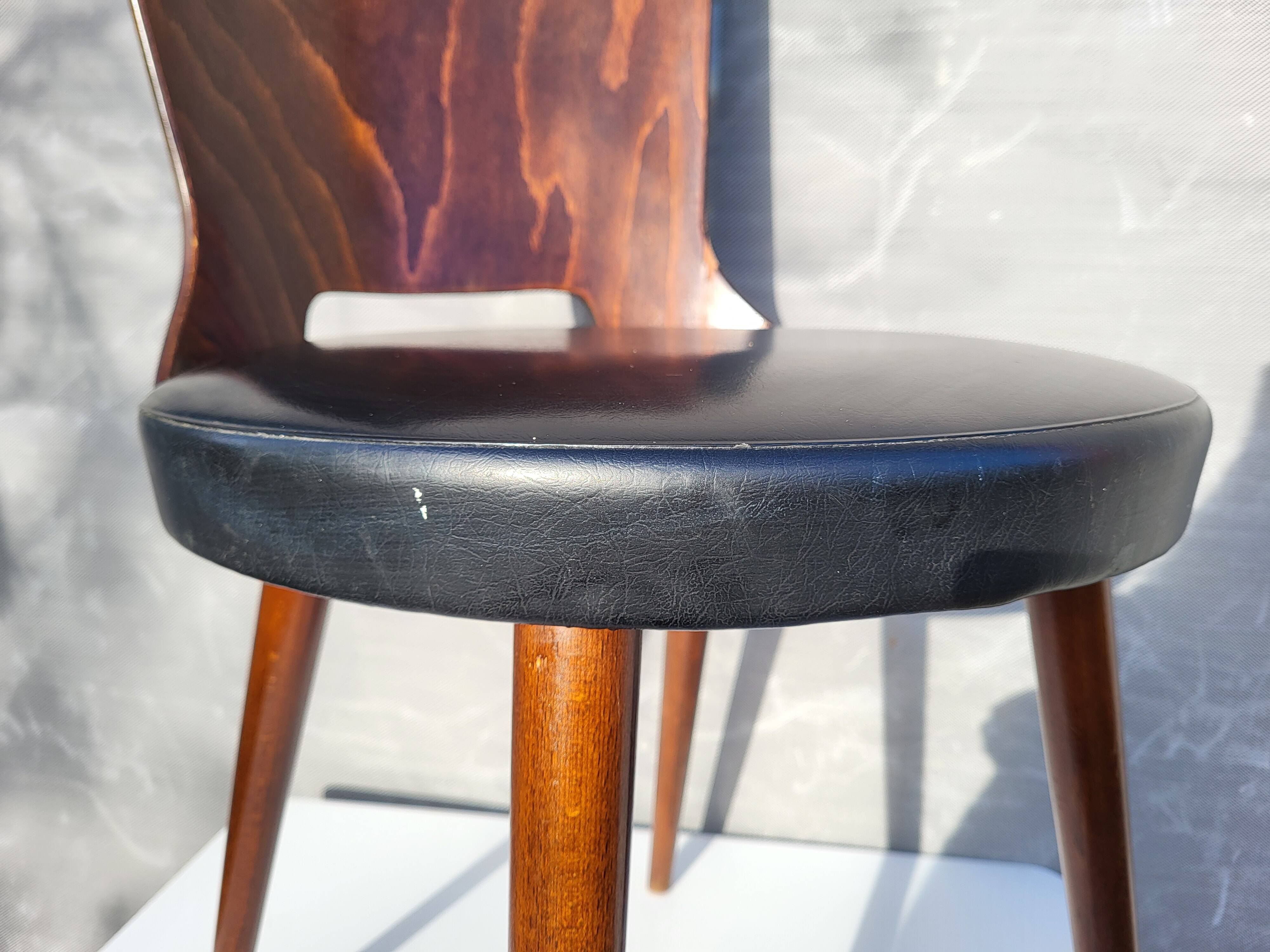 Pair of Dove chairs • Baumann • Black faux leather