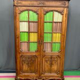 Liège bookcase in carved oak Regency style