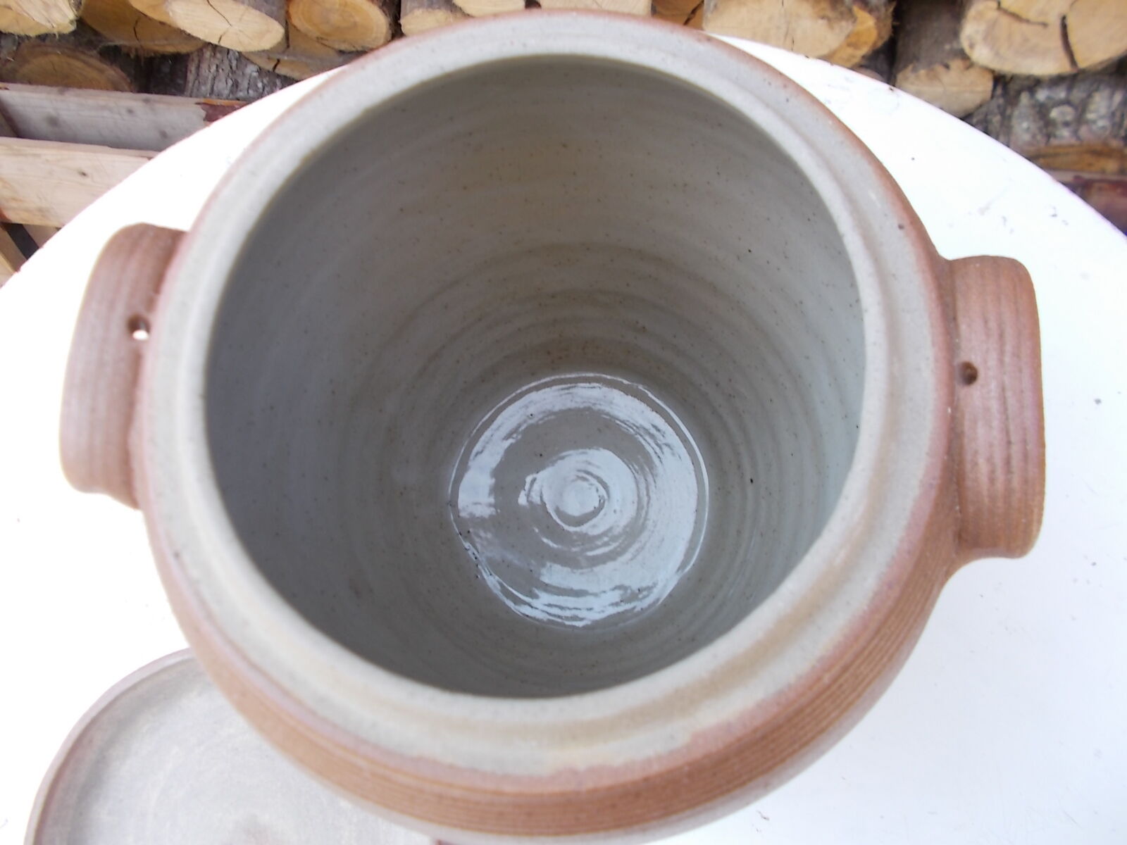 Old sandstone pot and its lid