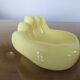 Empty hand-shaped pocket in pale yellow ceramic years70