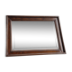 Old bevelled mirror with a wooden frame.
