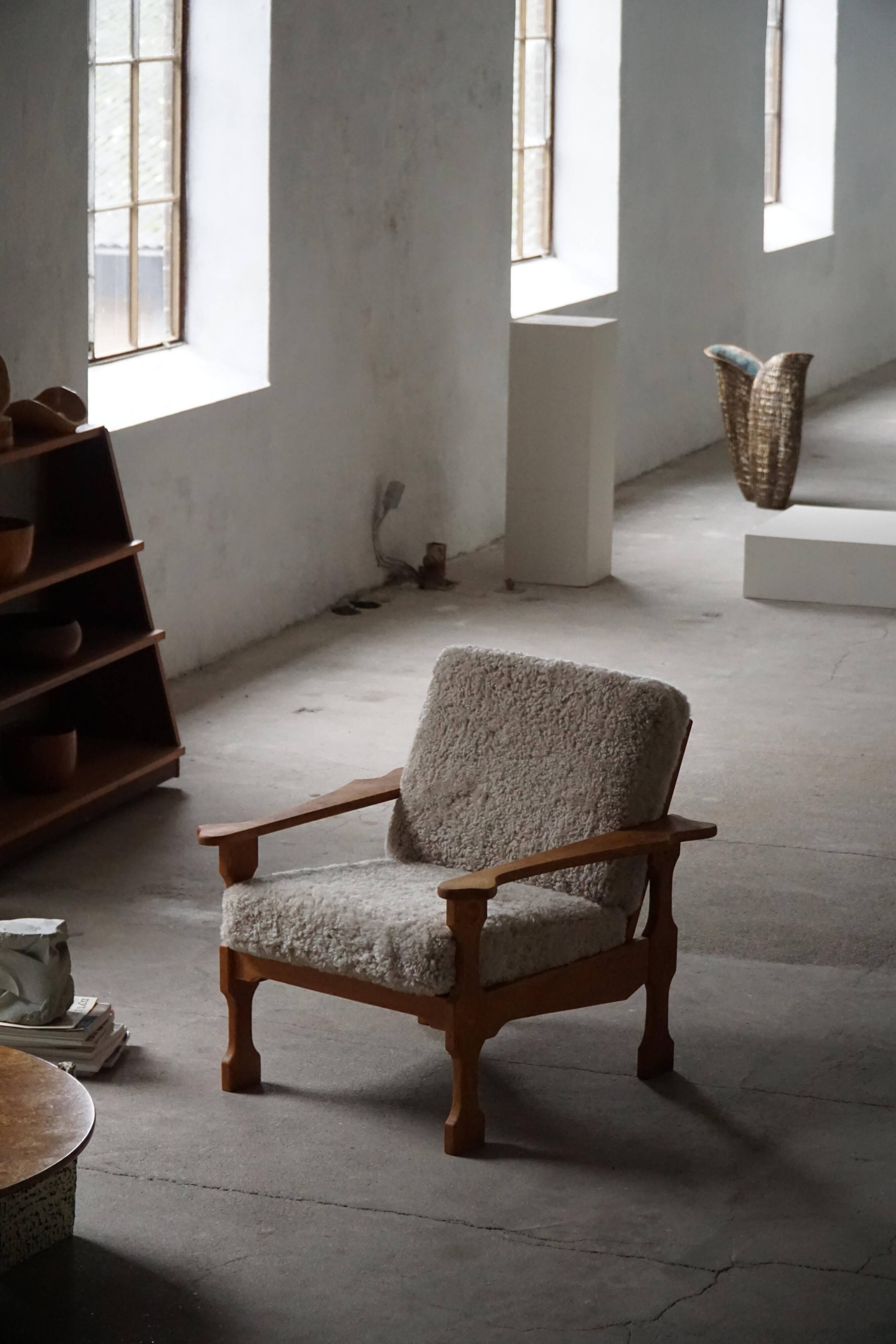 Modern Danish, Pair of Lounge Armchairs in Oak and Lambswool, Henning Kjærnulf, 1960s