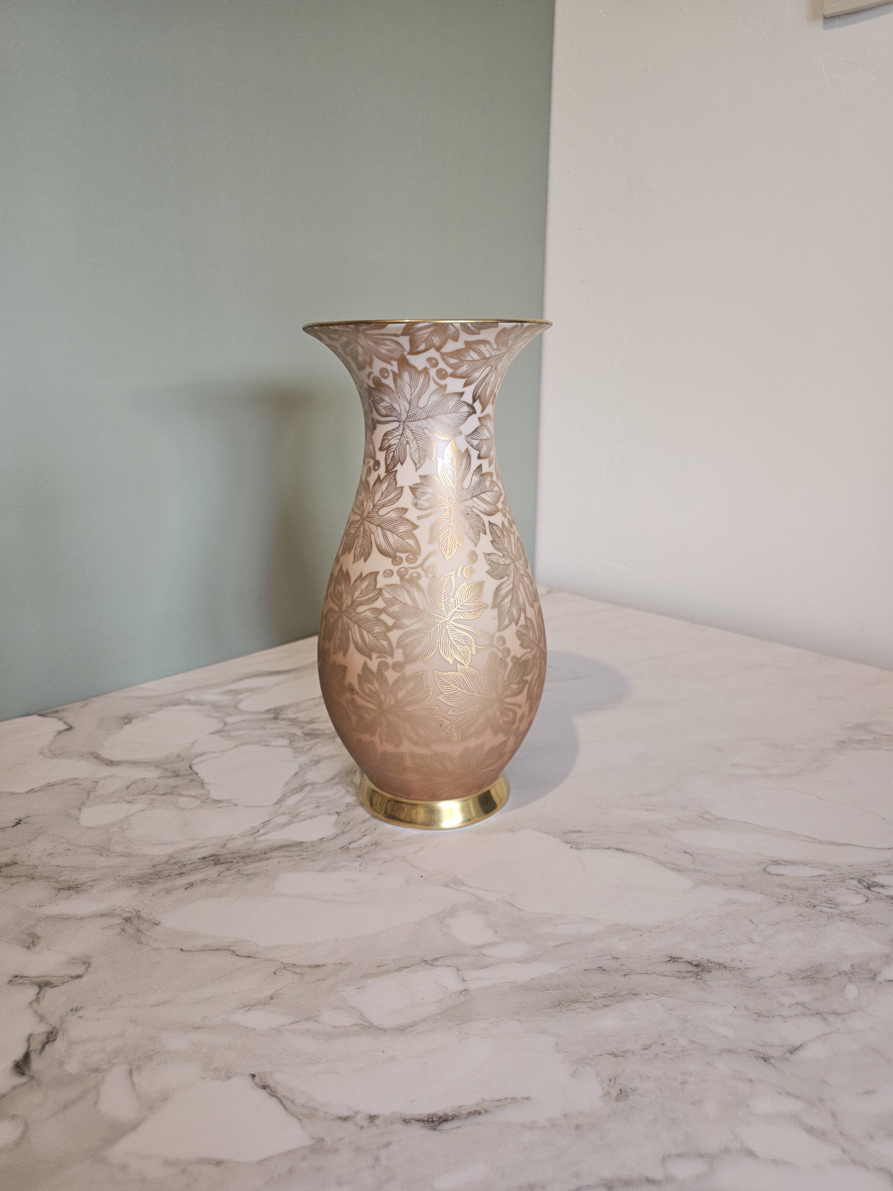 Porcelain vase with golden floral decoration by Johann Seltmann