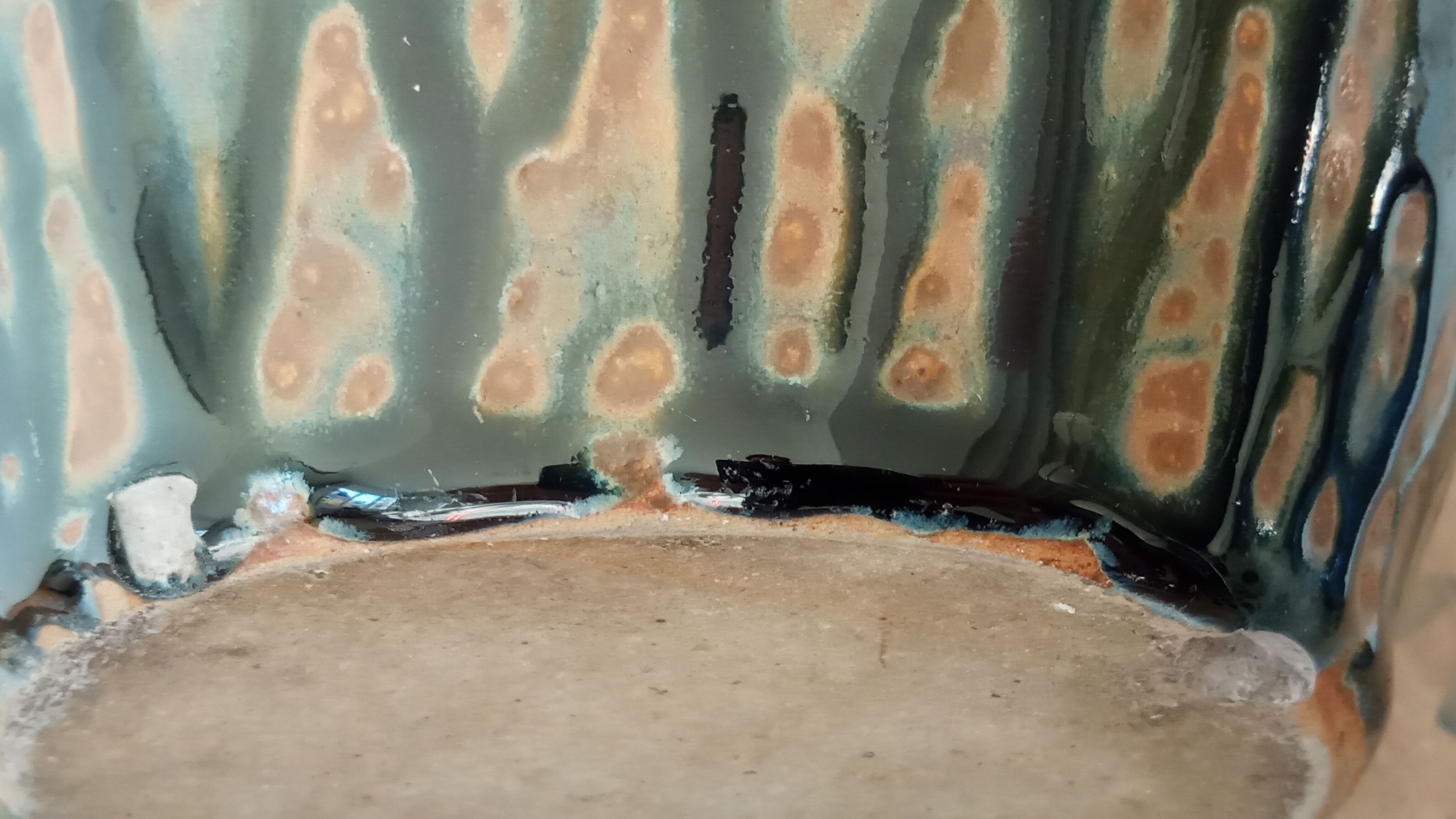 Enamelled sandstone vase