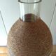 Cane glass-decorated vase and natural fibers