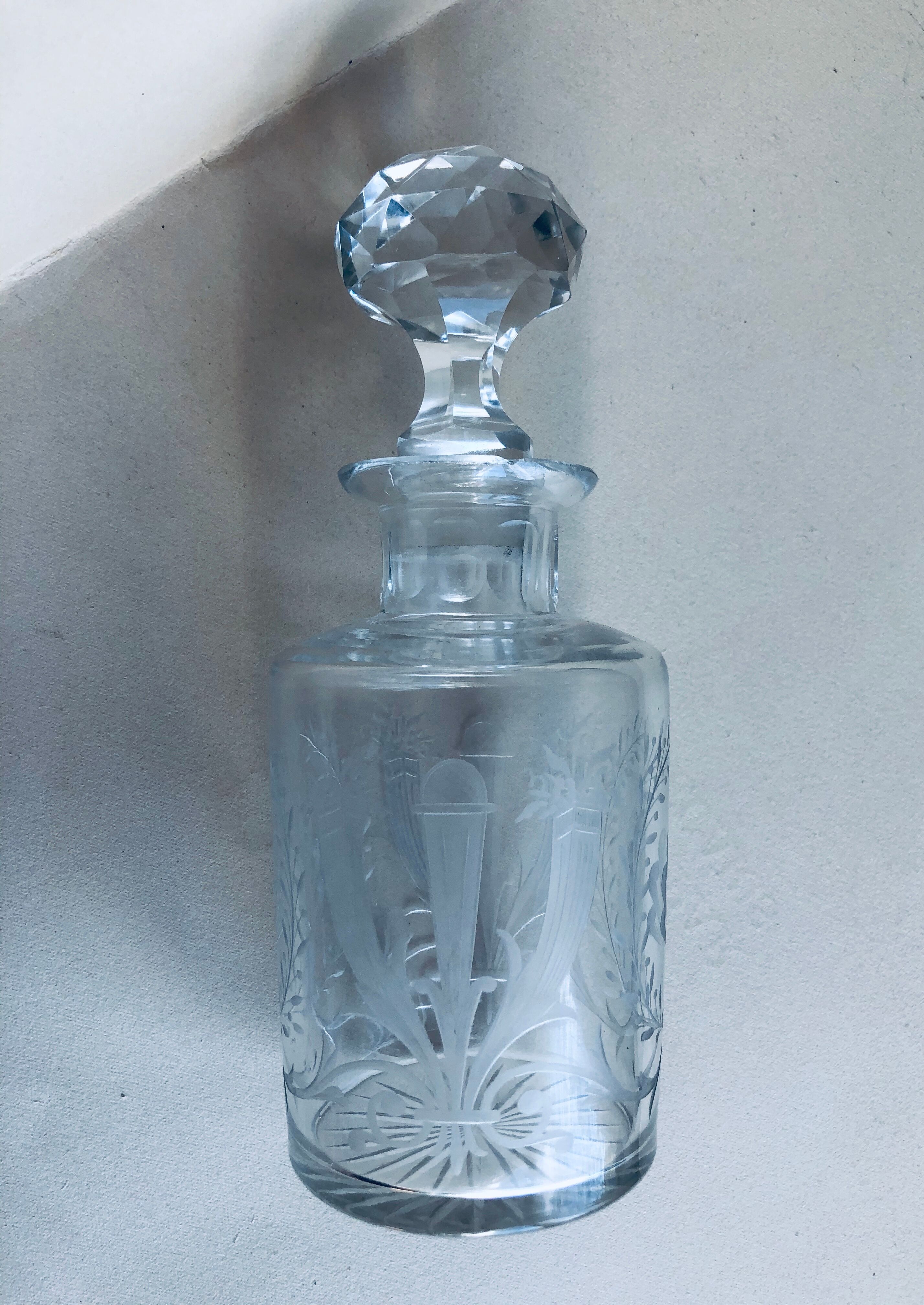 Old engraved crystal bottle