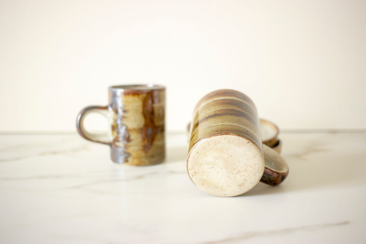Pair of stoneware cups and sub-cups
