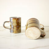 Pair of stoneware cups and sub-cups