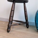 Tripod stool in turned wood, attributed to Charles Dudouyt, 20th century.