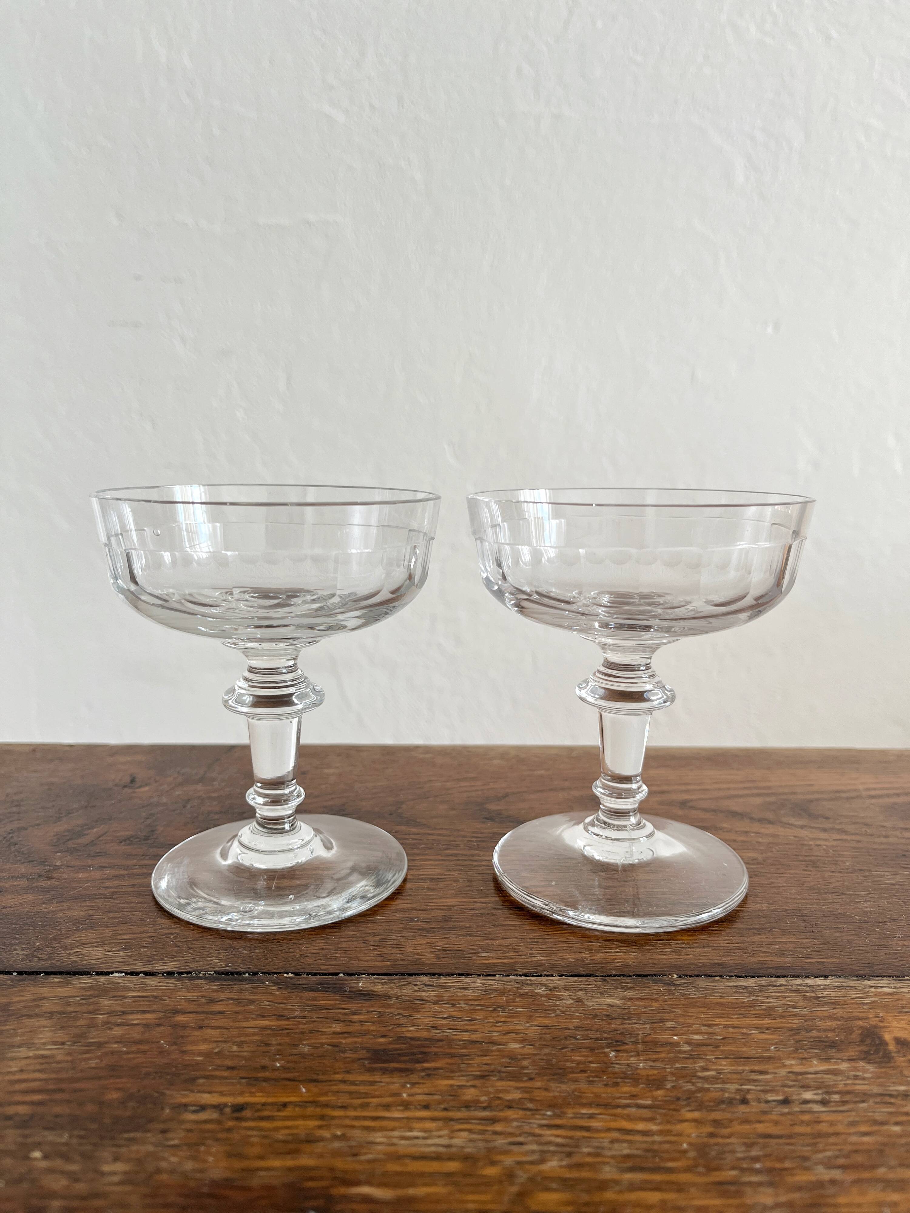 2 antique 19th-century blown glass champagne coupes with flat sides