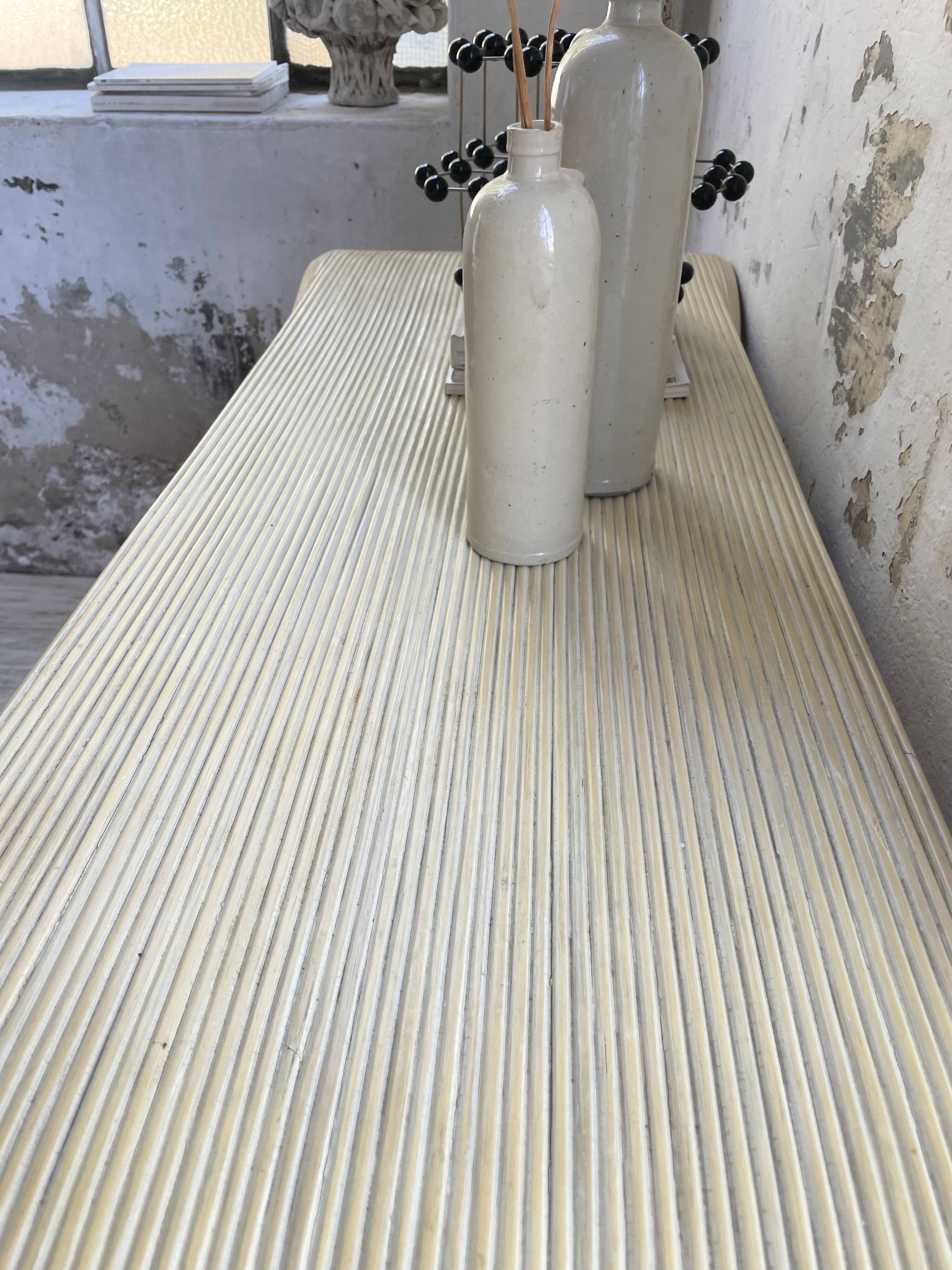 70s console in tropicalist rattan