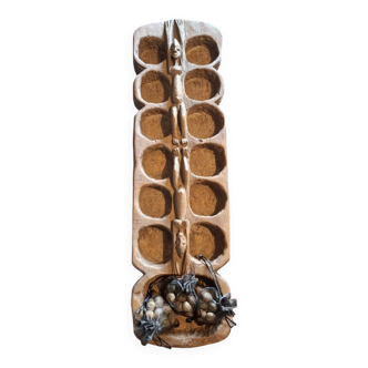 Genuine traditional Awalé made of carved solid wood.