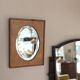 Bevelled oval mirror on oak frame