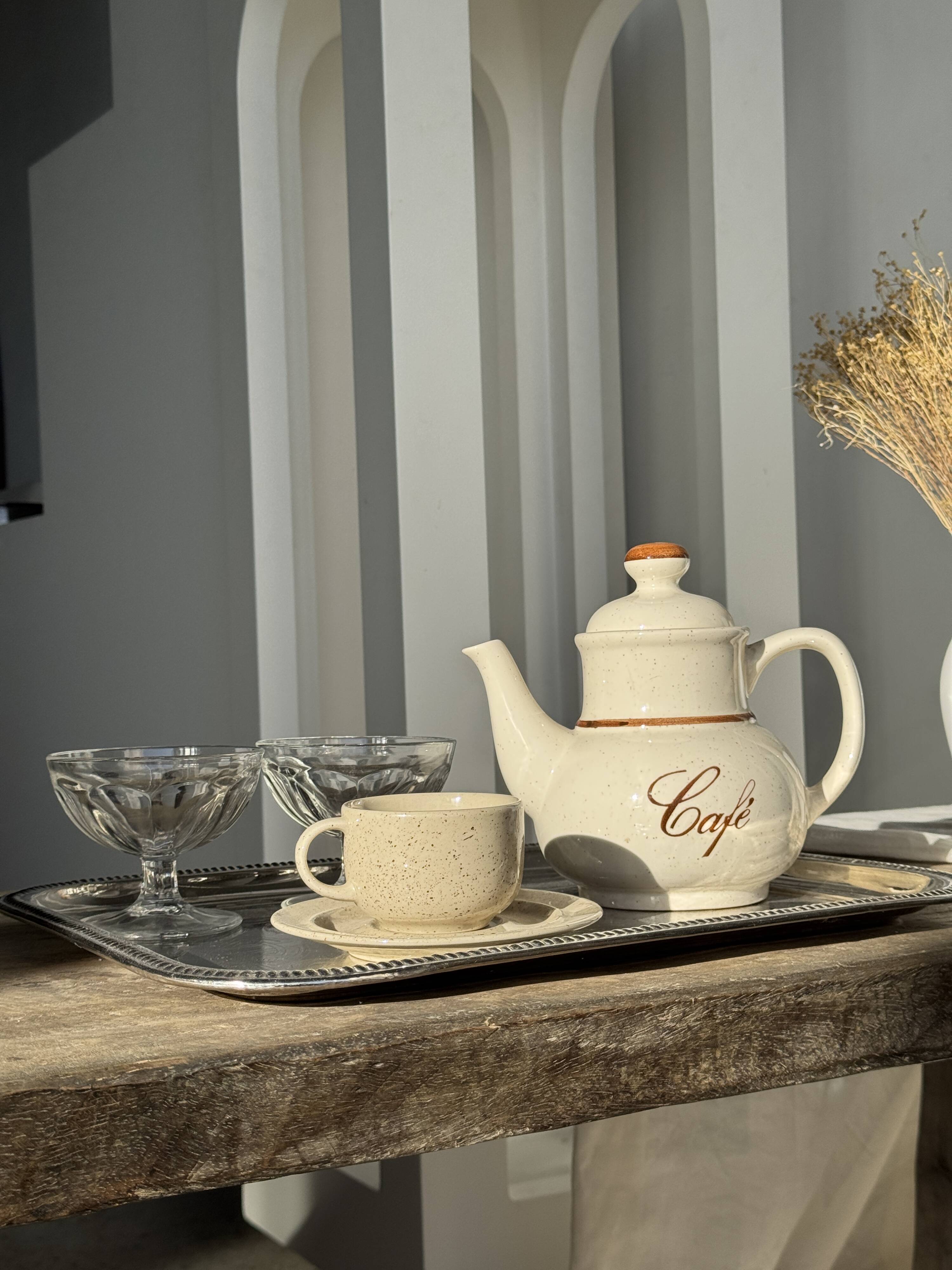 Set of 4 vintage speckled beige stoneware coffee cups.