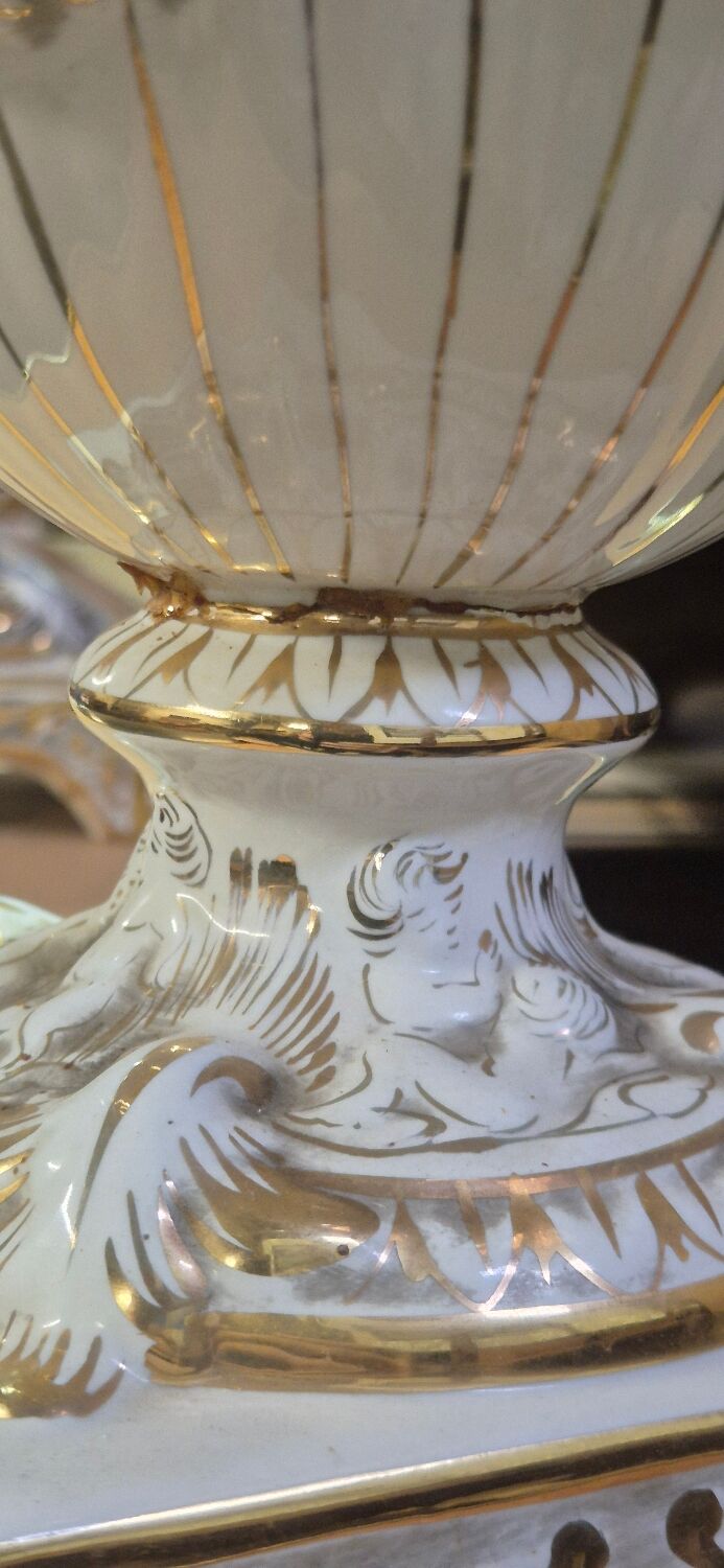 Italian coffee table with glass top, wooden base, and porcelain legs