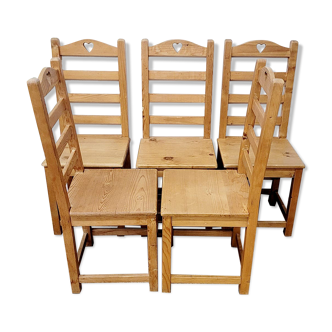 Five rustic chairs