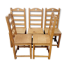 Five rustic chairs