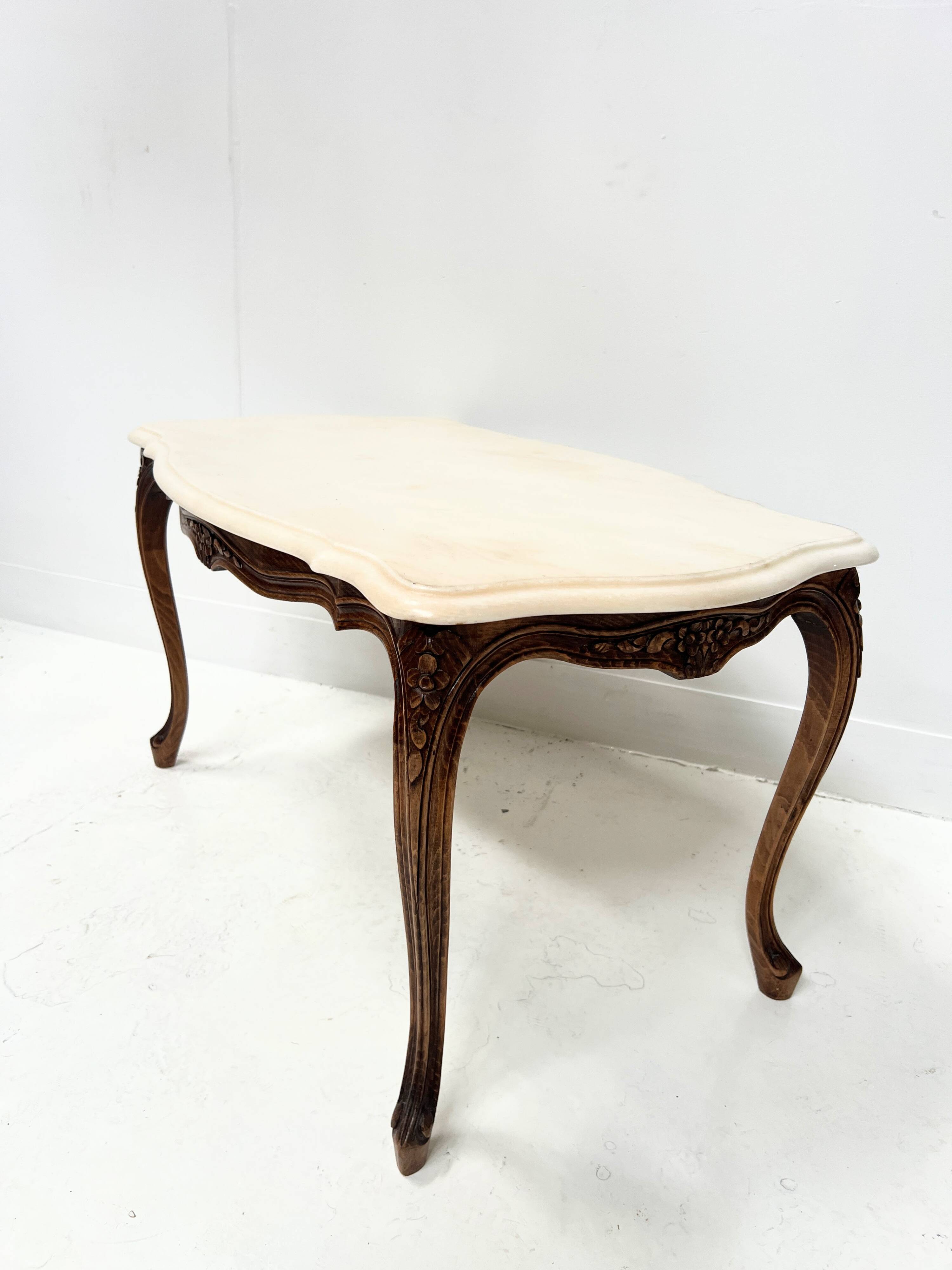 Louis XV style coffee table in patinated beech, 20th century.