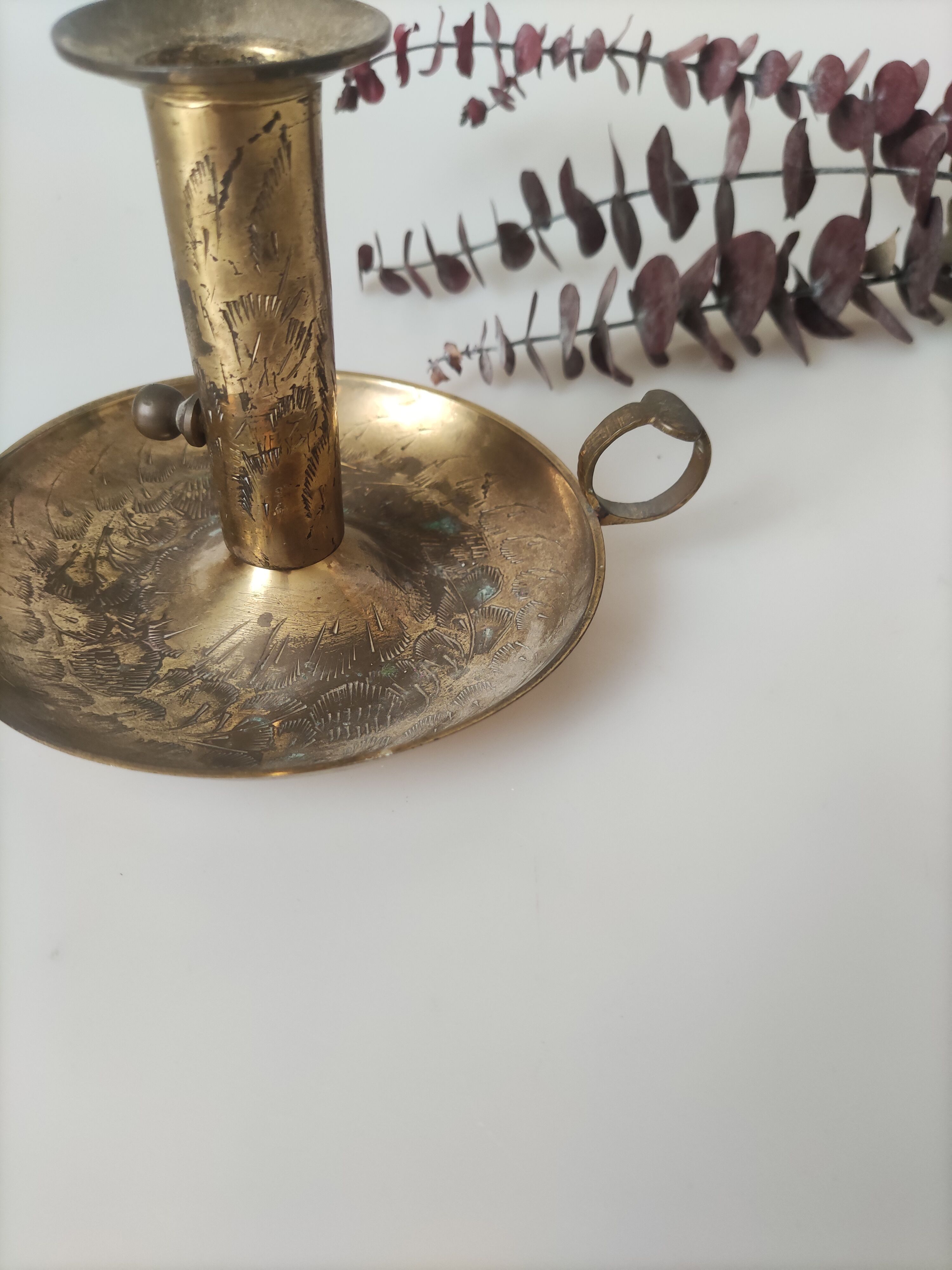 Brass cellar rat candle holder
