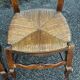 Set of 4 Louis XV straw chairs – solid wood – curved backrest