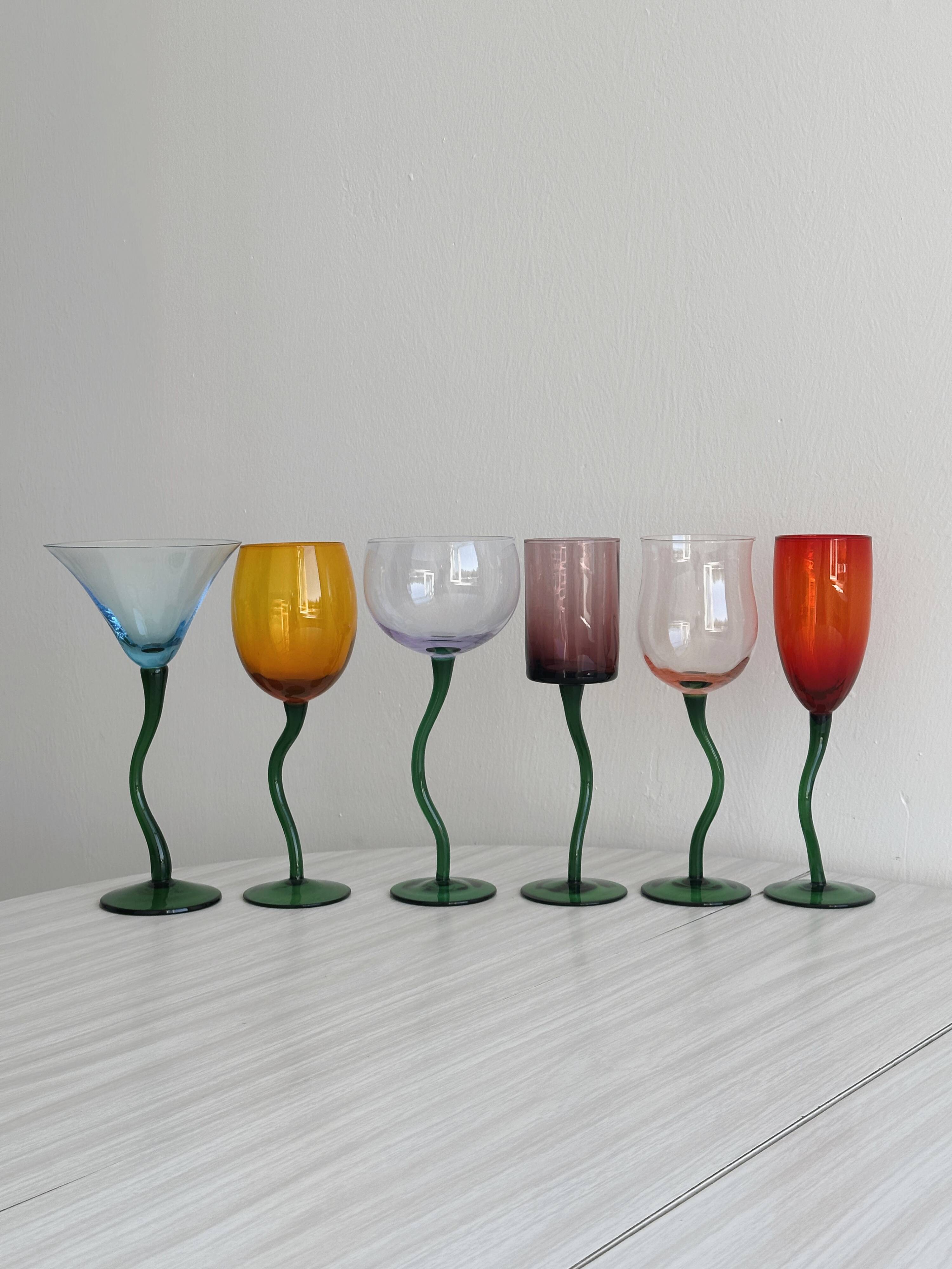 6 colored glasses with twisted feet