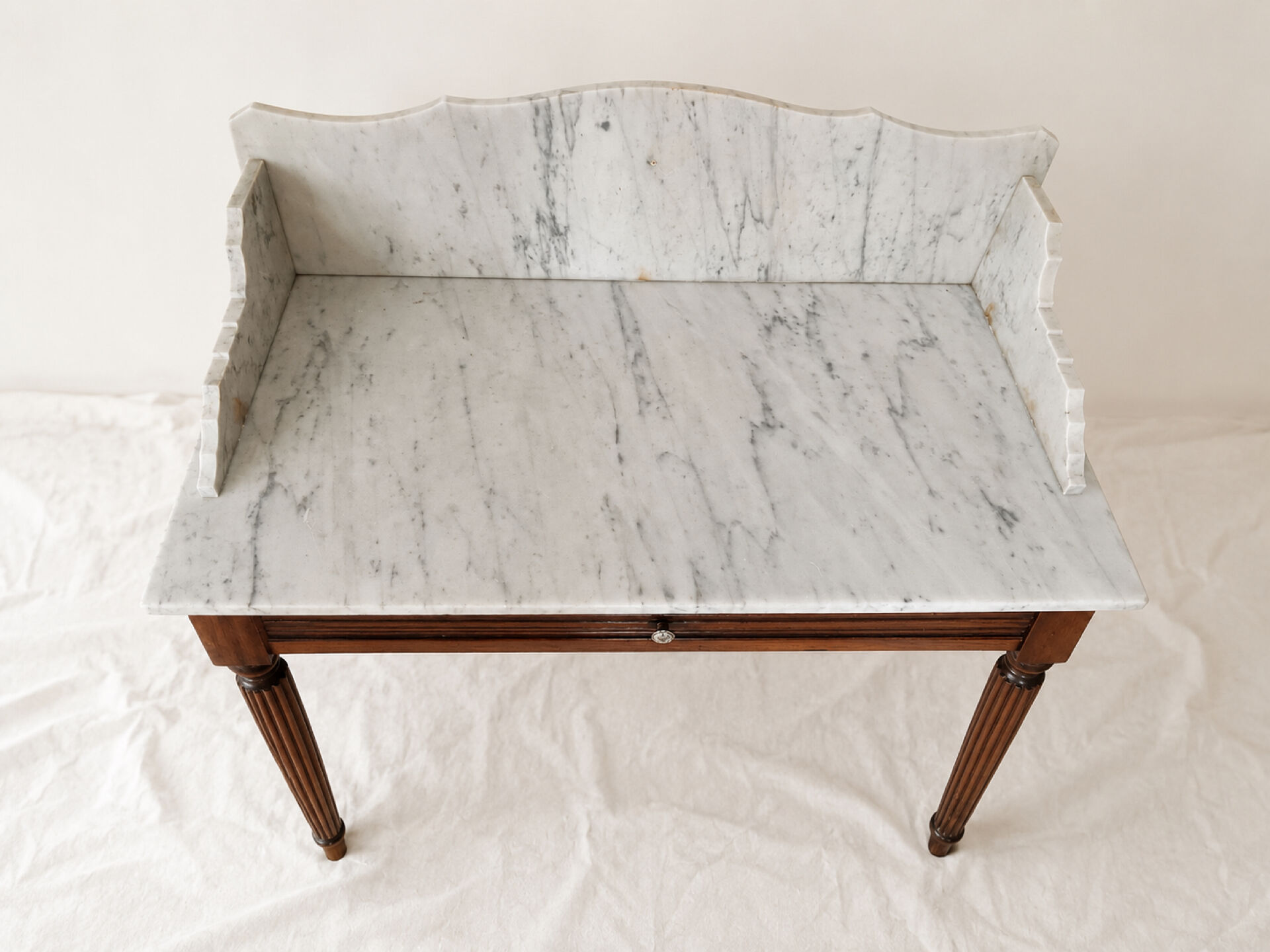 Antique wooden and veined white marble dresser, Louis XVI style.