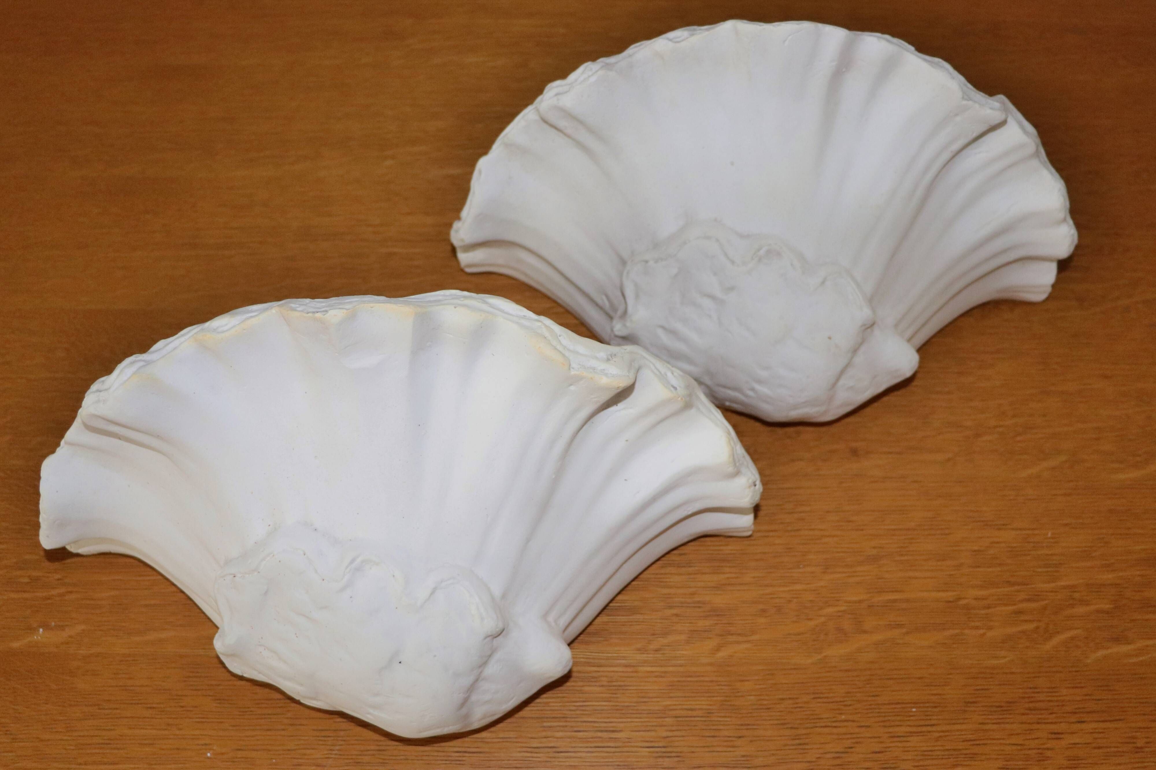 Pair of wall lamps plaster shell circa 1930