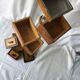Small 1930s wooden and glass furniture with sliding storage boxes