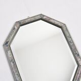 Old octagonal beveled mirror.